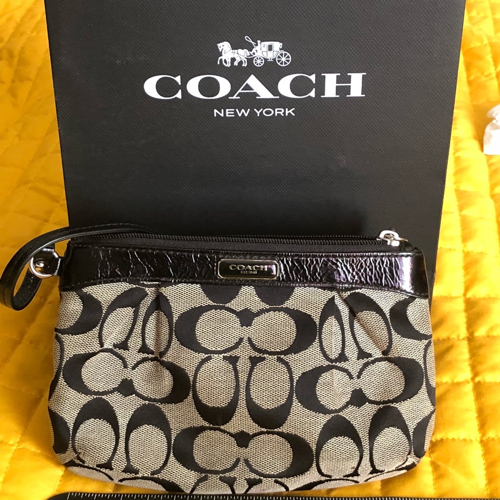SOLD ———-Authentic Wristlet , By Coach New York.